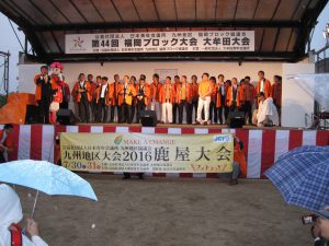 大懇親会での21LOM理事長登壇。鹿屋青年会議所さんが7月に行われるブロック大会へのキャラバンに来られてあります。